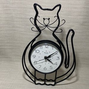 Kitty cat clock. Looks like it could also be hang
